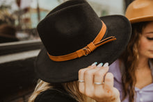 Fashion hat with buckle around brim