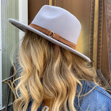 Fashion hat with buckle around brim